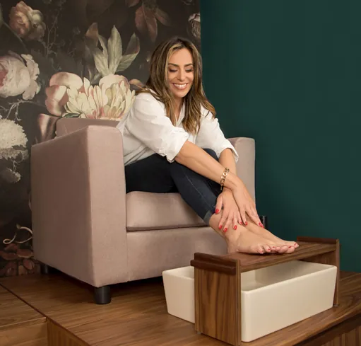 A client relaxing in the pedicure chair